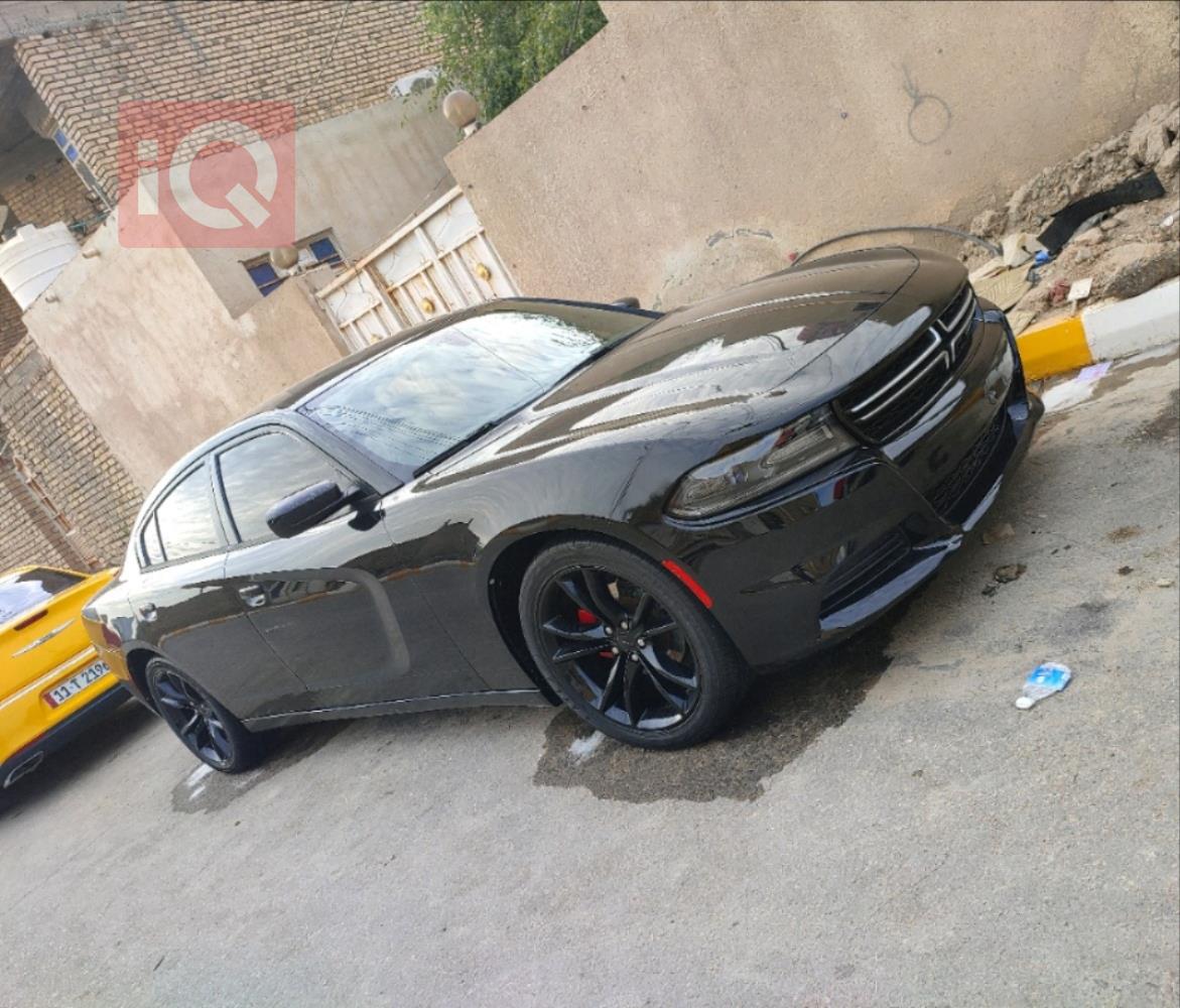 دۆج چارجەر